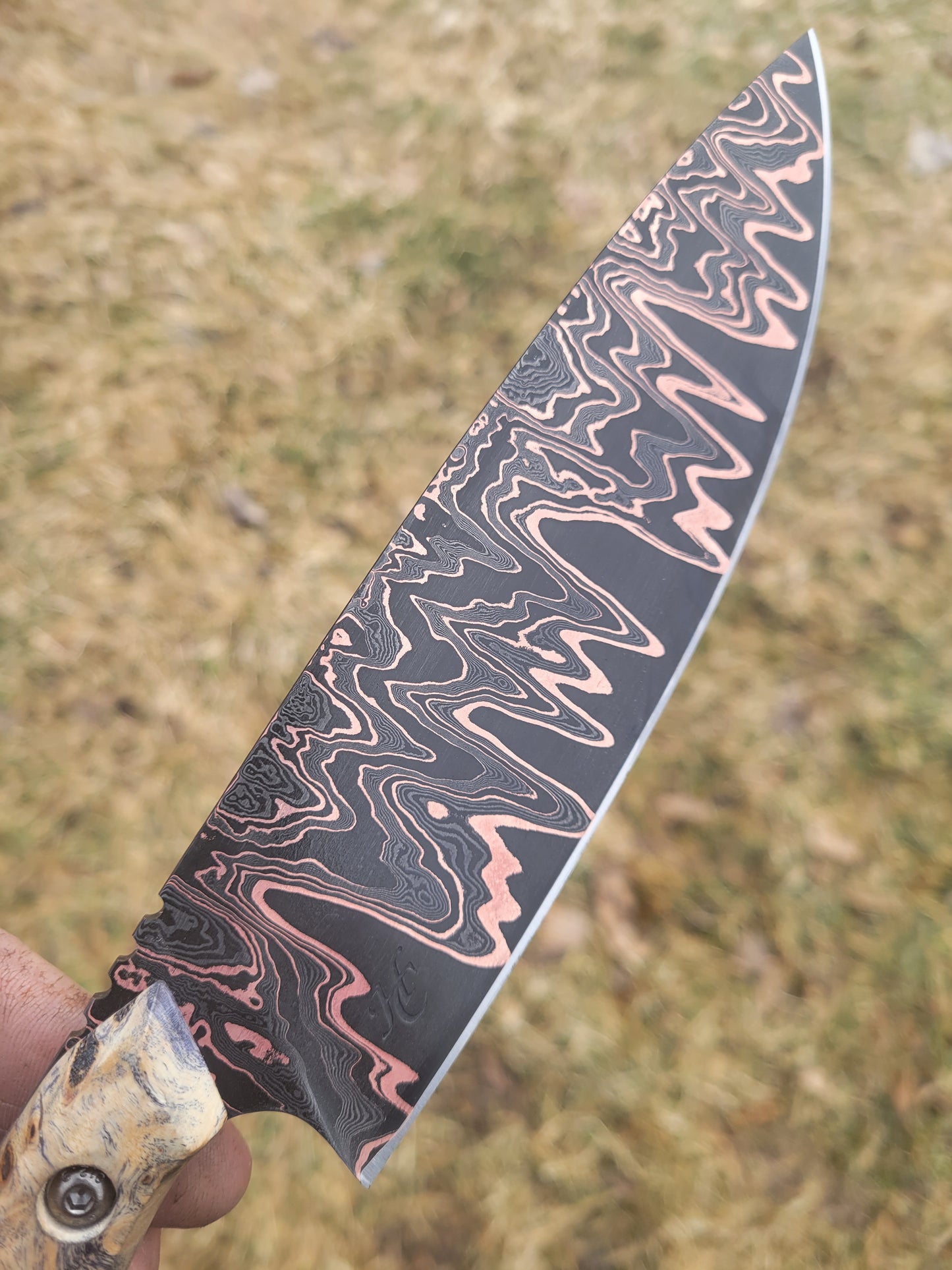 Copper Damascus chefs knife