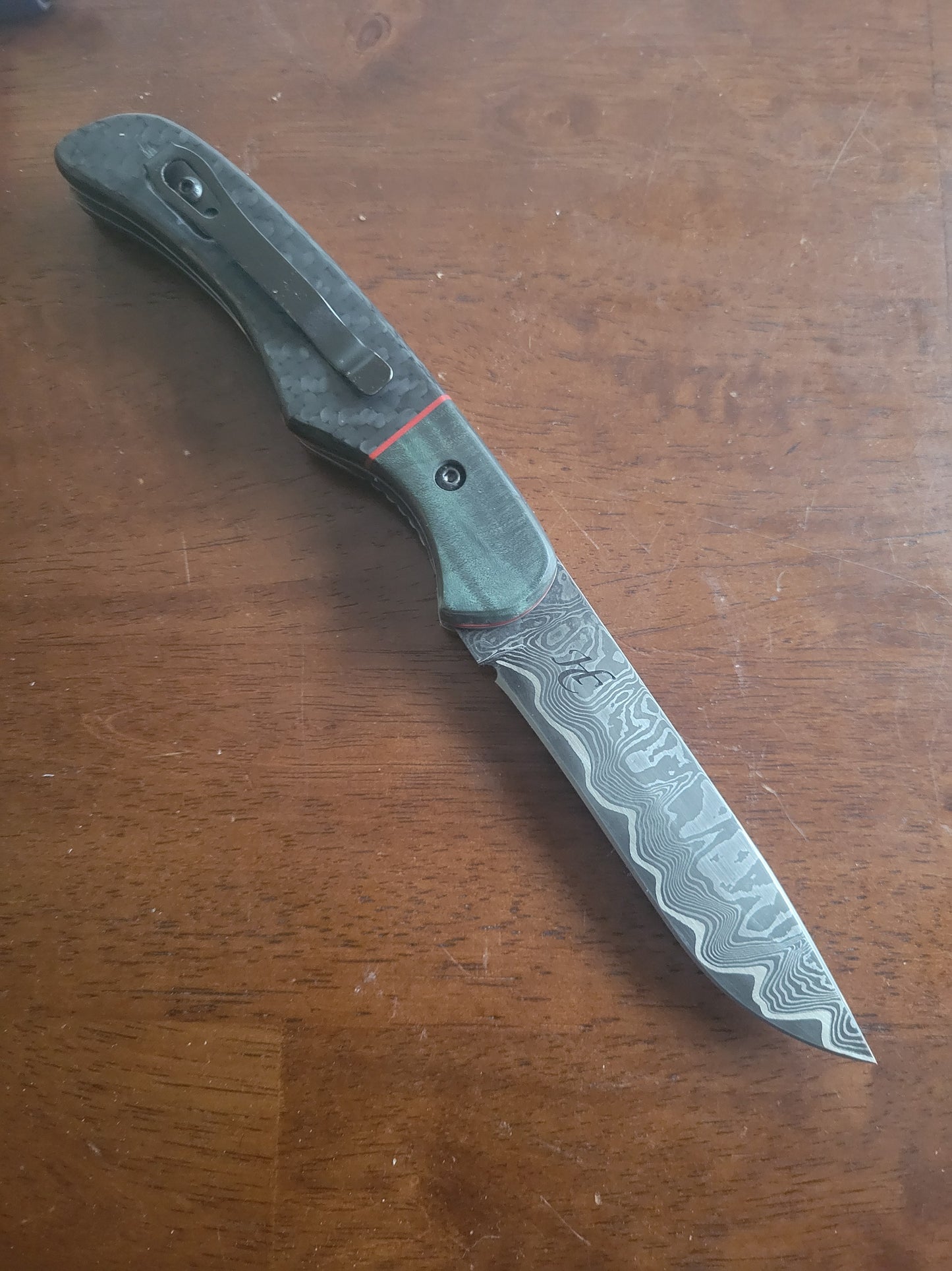 100 layer nickel damascus liner lock