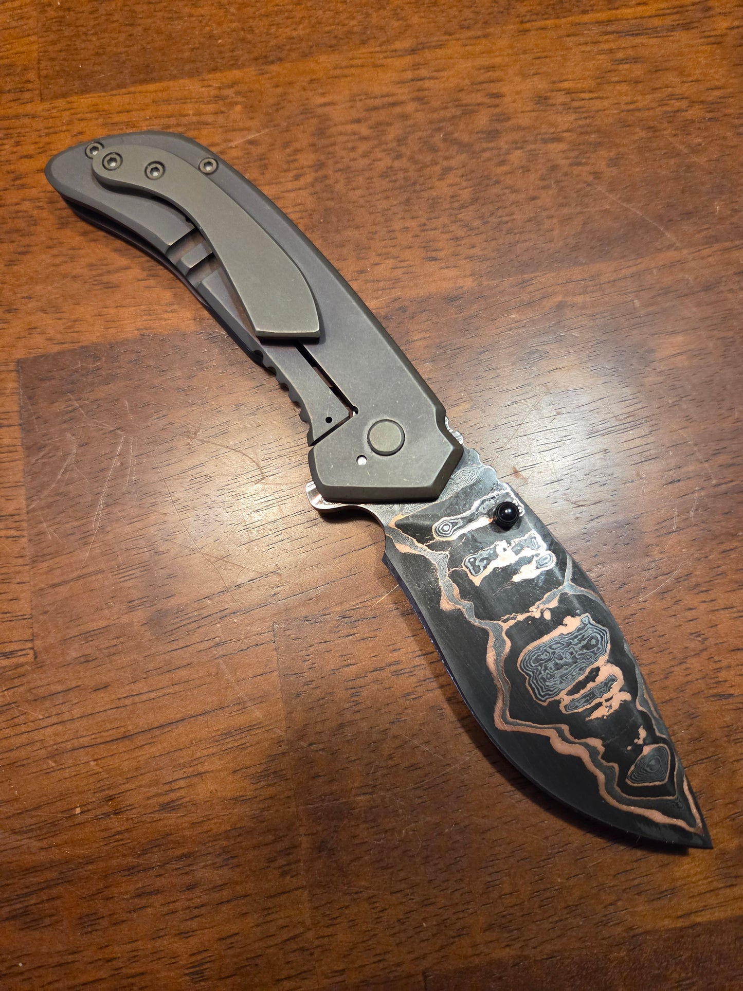 Titanium frame lock