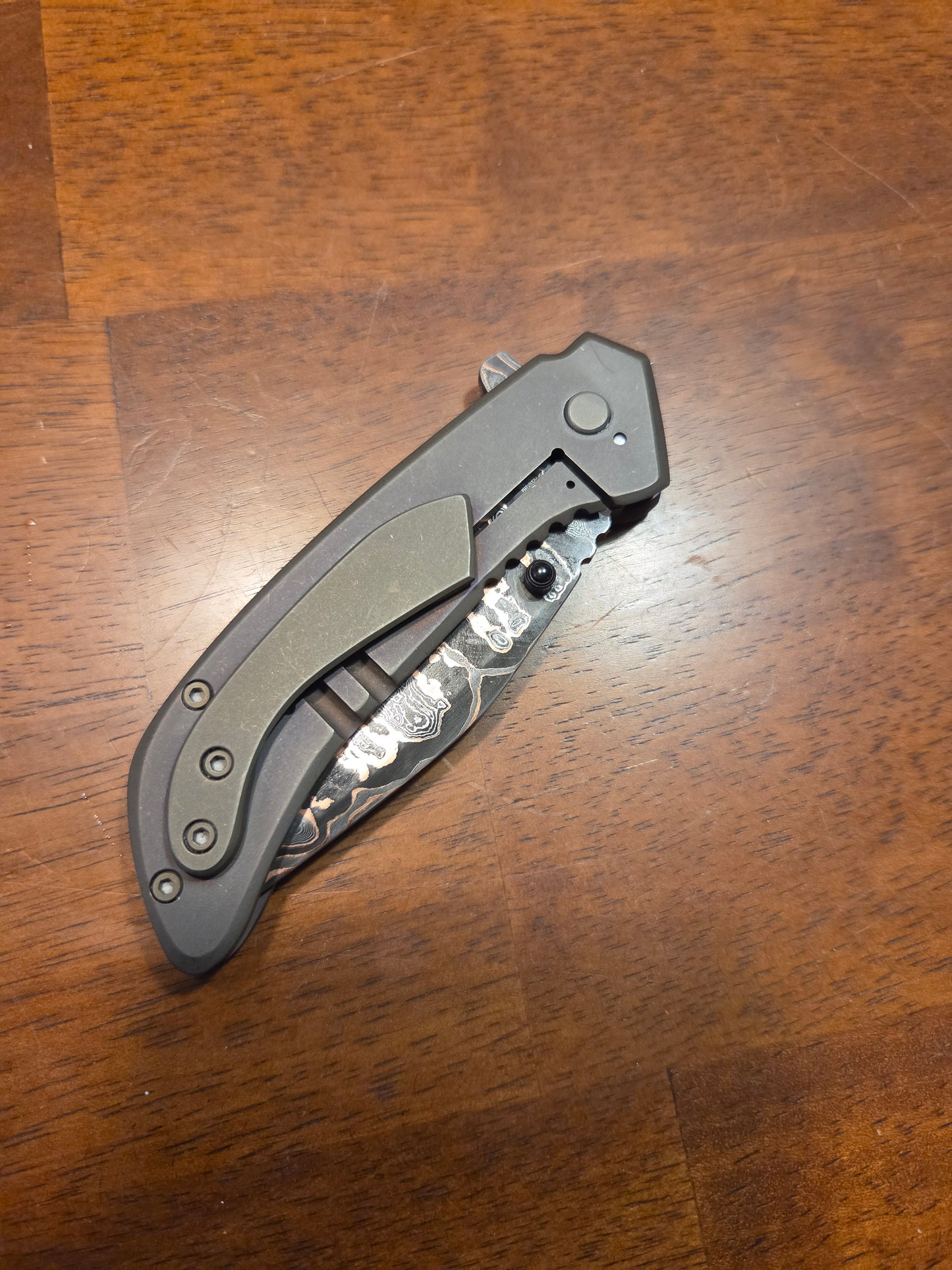 Titanium frame lock