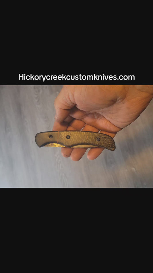 100 layer nickel damascus liner lock