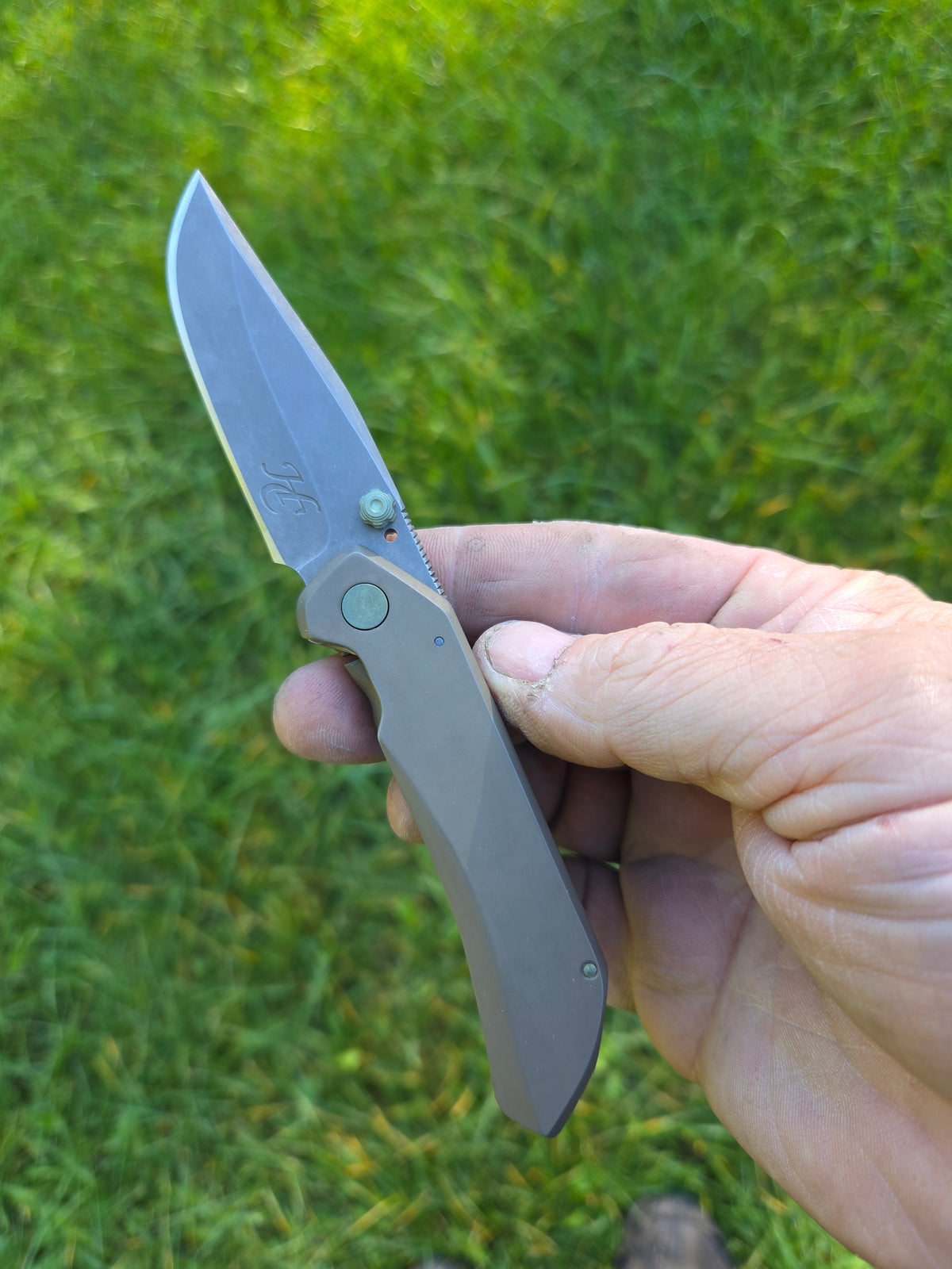 3" titanium frame lock.