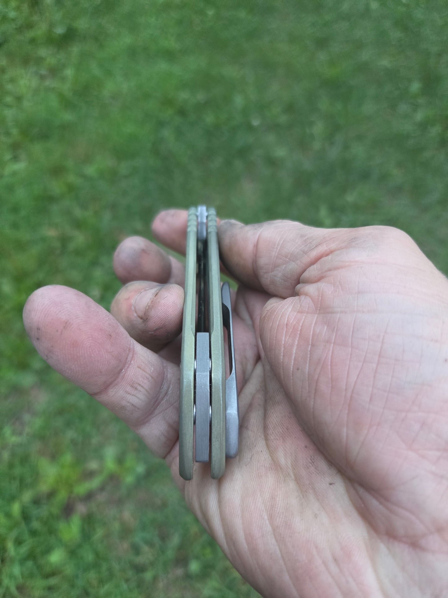 Green titanium frame lock