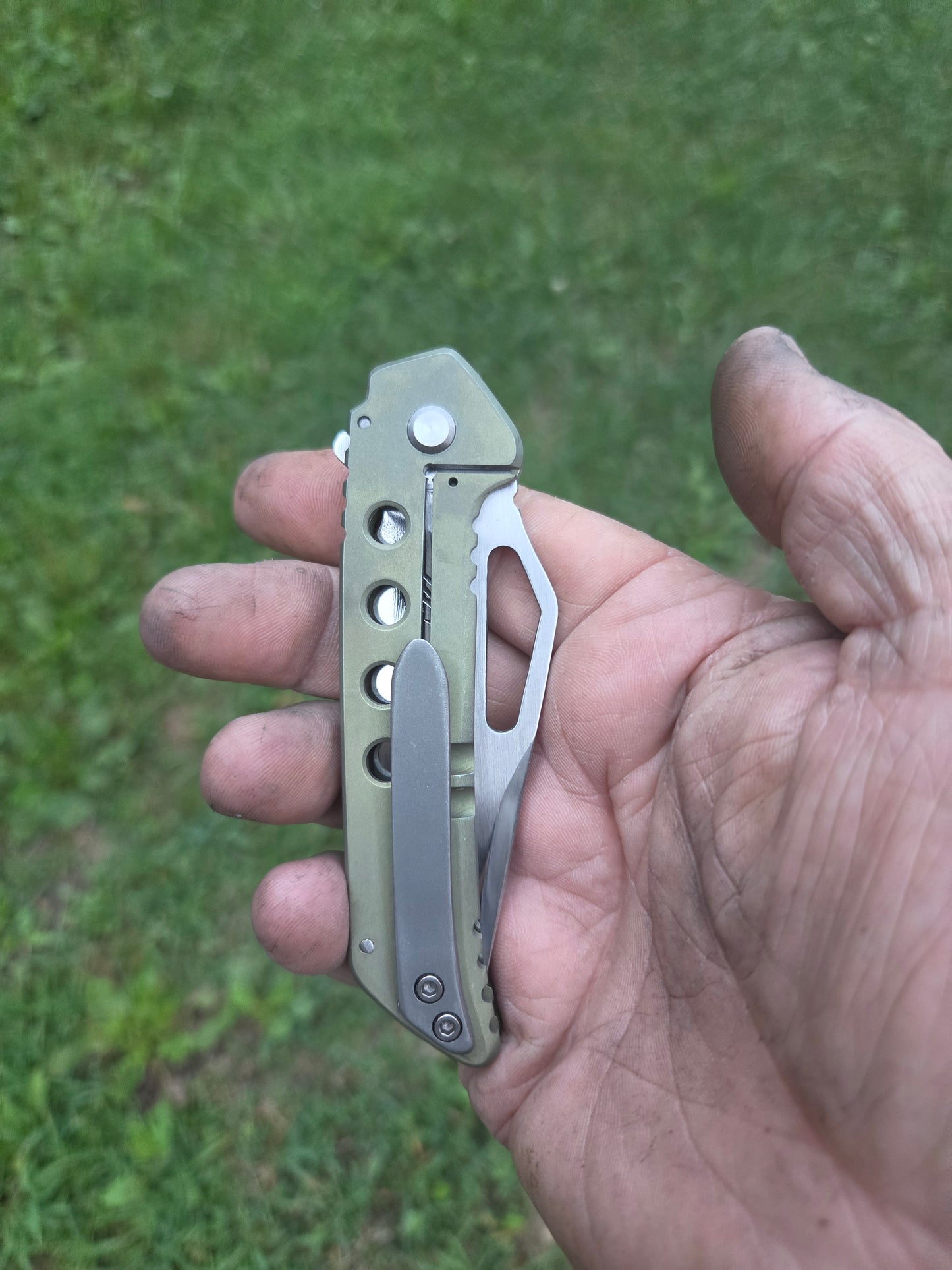 Green titanium frame lock