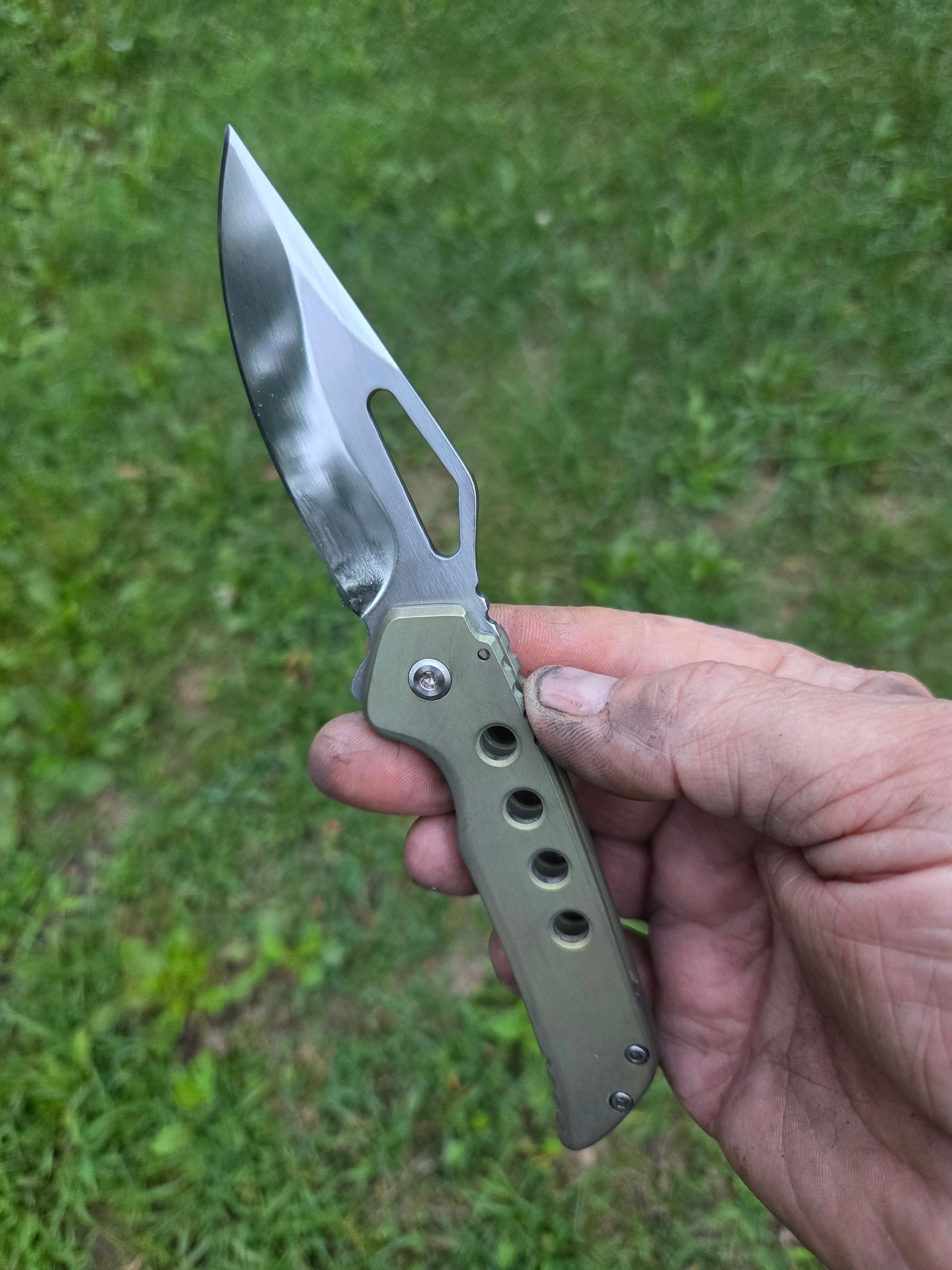 Green titanium frame lock