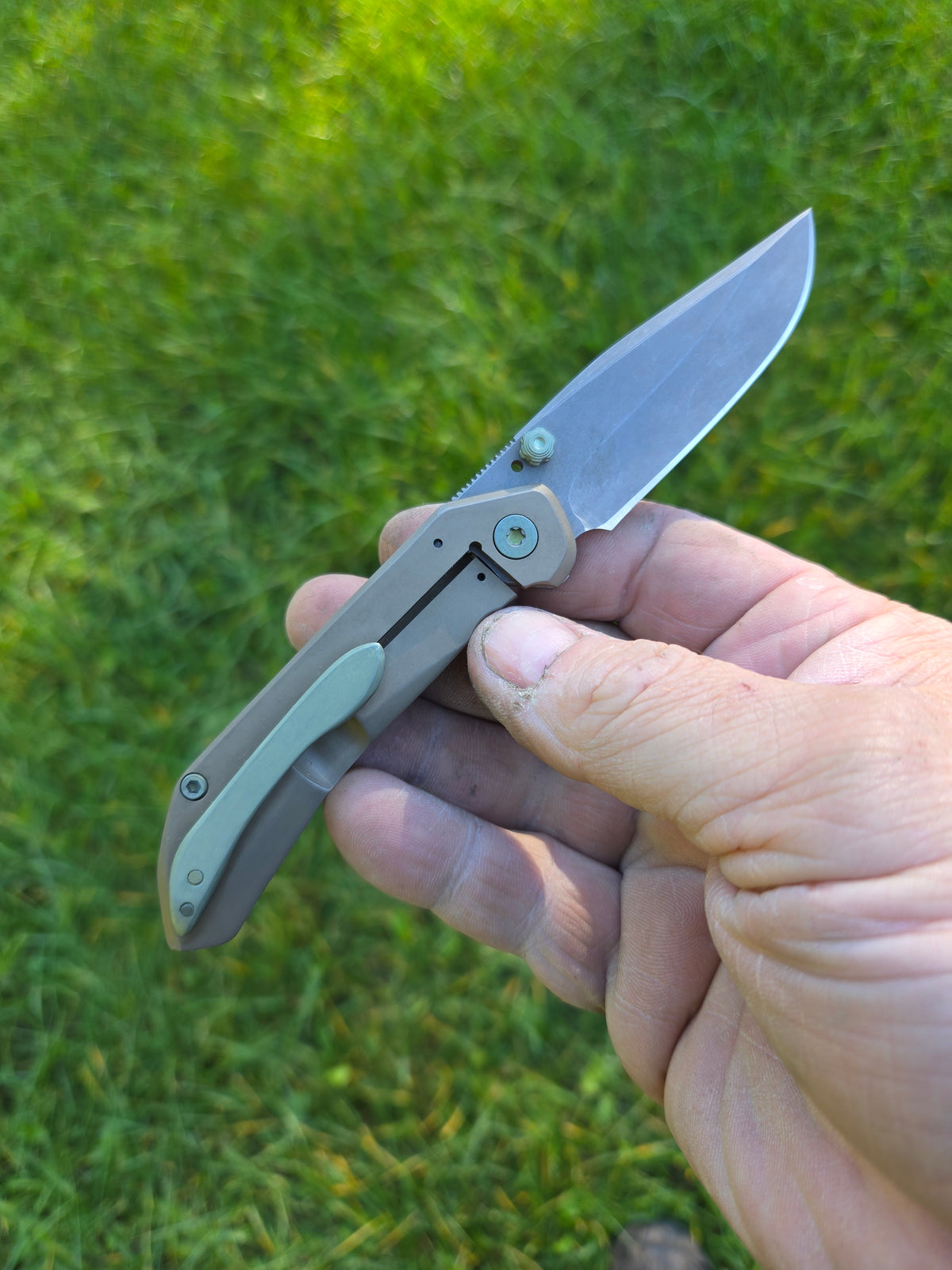 3" titanium frame lock.