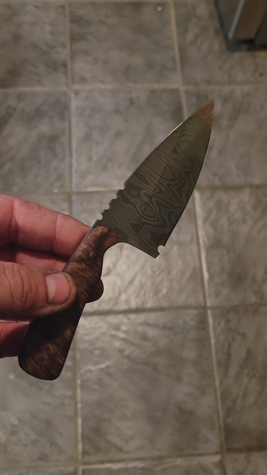 Hand forged 4" skinner with a 1095 15n20 damascus blade.